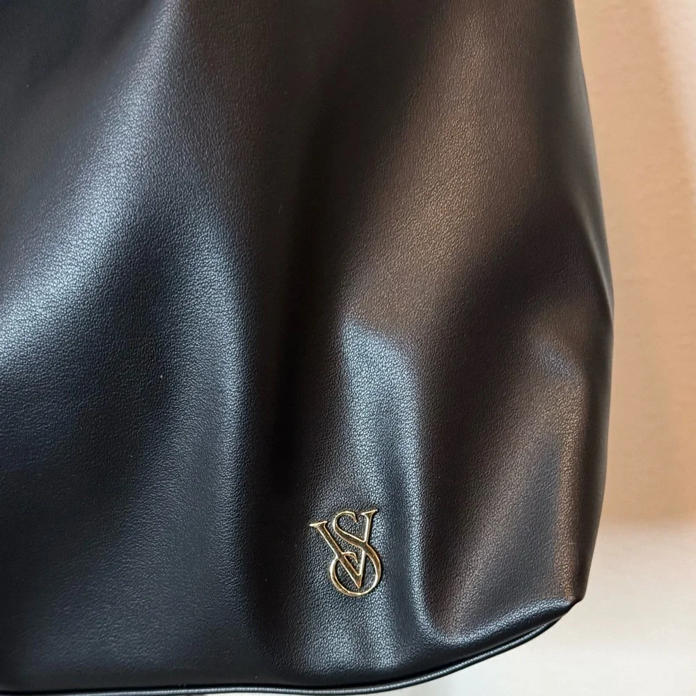 NWT Victoria’s Secret black faux leather hobo bag with bow detail